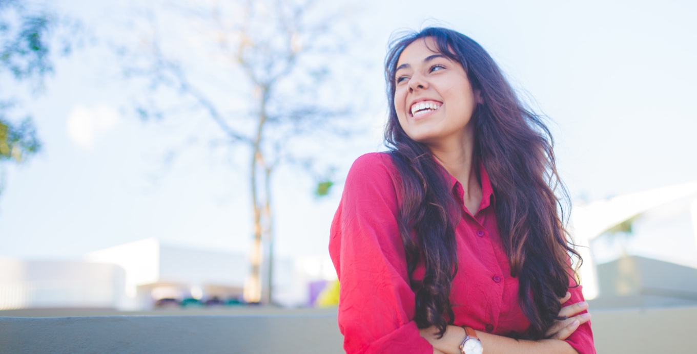 Woman looking away and smiling