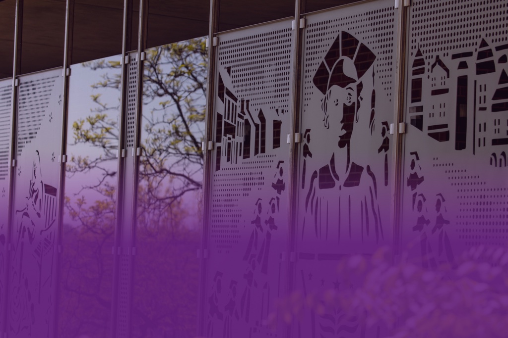 Group of students talking and laughing.