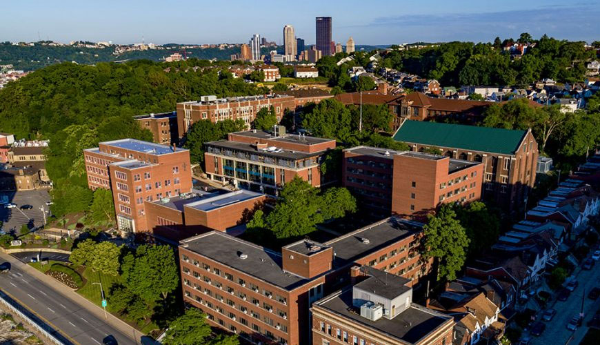 Christen Rose in front of a classroom